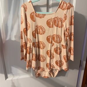 Kate Quinn Pumpkin Print Cream and Orange onesie